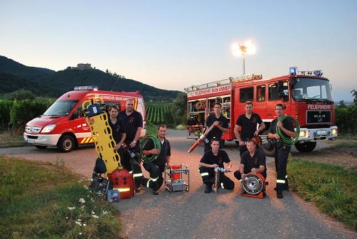 The Fire Brigade of the city Maikammer in Germany, situated on the wine route. In the background you see the `Hambach castle`, which is considered to be the symbol of the democracy movement.